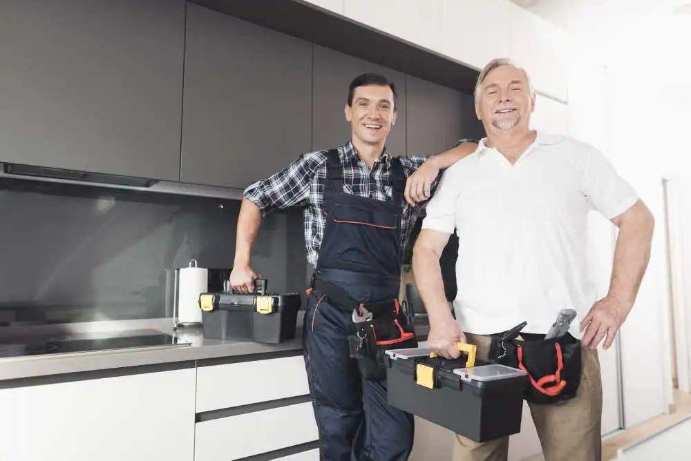 Two tradesmen standing side by side